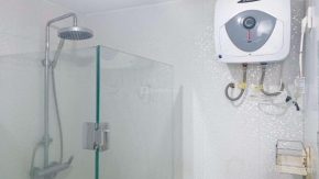 Warm and Comfort Living 1BR at 8th Ambassade Kuningan Apartment By Travelio